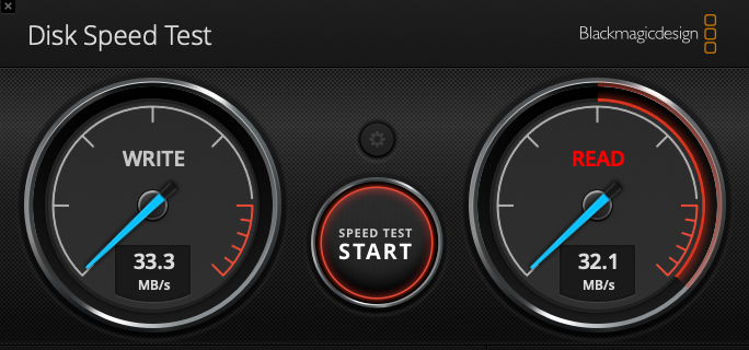 Blackmagic Disk Speed Test result showing 33.3 MB/s write and 32.1 MB/s read for the SanDisk SSD used before this setup.
